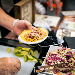Food being served at exhibit show welcome reception